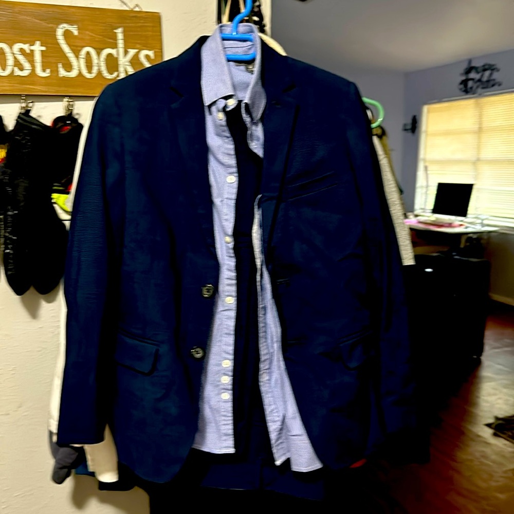 Boys size 10-12 blue suit set. Includes pants, blazer, and dress shirt!